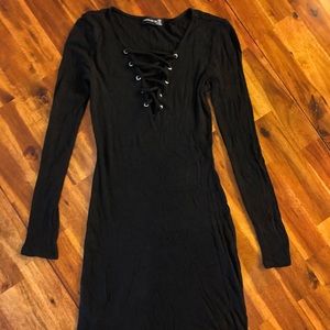 Long sleeve black mini dress with laced up V-neck